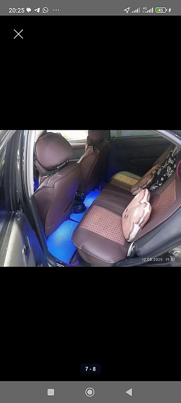 Chevrolet Aveo: 2009 г., Седан — 7