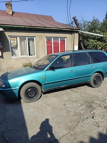 машина 50000сом: Nissan Primera: 1993 г., 2 л — 2