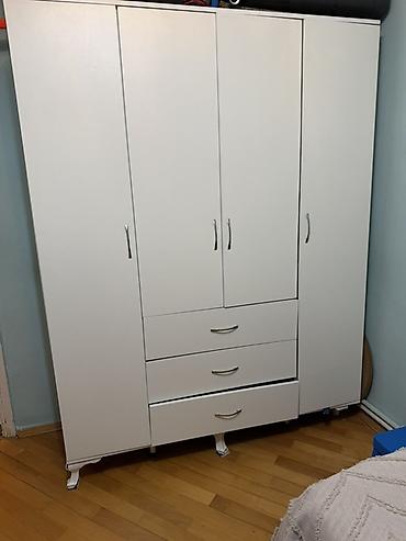 Ağ rəngli çoxfunksiyalı geyim dolabı - 4 qapılı dizayn: iki yan bölmə lalafo.az -da Ağ rəngli çoxfunksiyalı geyim dolabı - 4 qapılı dizayn: iki yan bölmə
