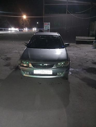 обмен демио: Mazda 323: 1999 г., Механика, Бензин, Универсал — 2