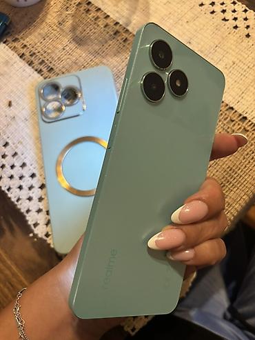 Realme: Realme C51, zelena boja - Ekran: (oko) sa „waterdrop” notch‑om; — 2