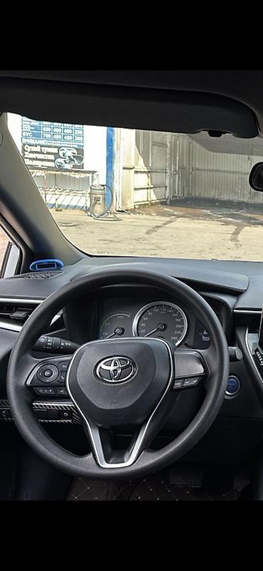 mark x: Toyota Corolla: 2022 г., 1.8 л, Гибрид, Седан — 5