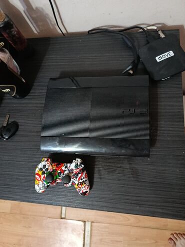 PS3 (Sony PlayStation 3): Sony PlayStation 3 Super Slim konzola (top‑loader) sa kamuflažnim — 9