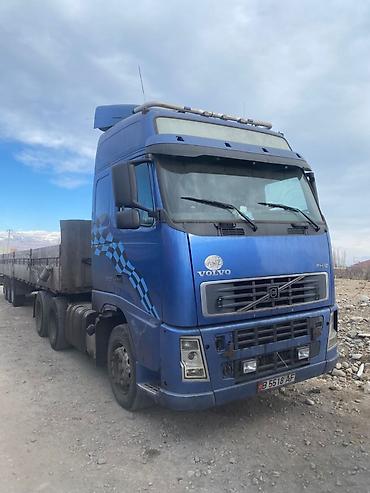 Тягачи: Тягач, Volvo, 2003 г., Бортовой — 1