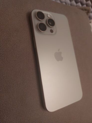 mac mini m4 qiymeti: IPhone 15 Pro Max, 256 GB, Natural Titanium, Barmaq izi, Face ID