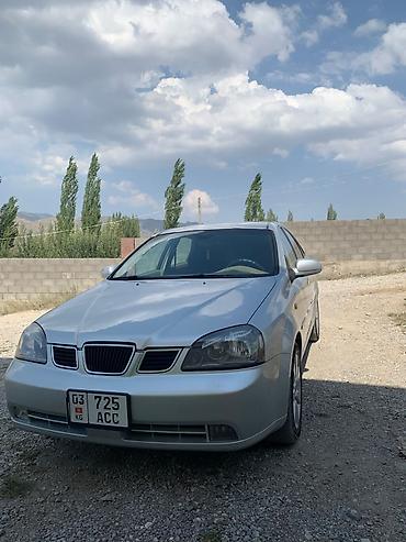 с номерами: Daewoo Lacetti: 2004 г., 1.6 л, Автомат, Бензин, Седан — 1