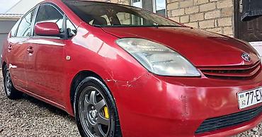 pirus disk: Toyota Prius (2-ci nəsil) – qırmızı rəngdə hibrid hetçbek. Salam — 4