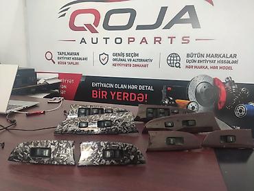 Düymələr: Avtomobil şüşə qaldırıcı düymələri üçün qapı paneli blokları
 Lexus — 1