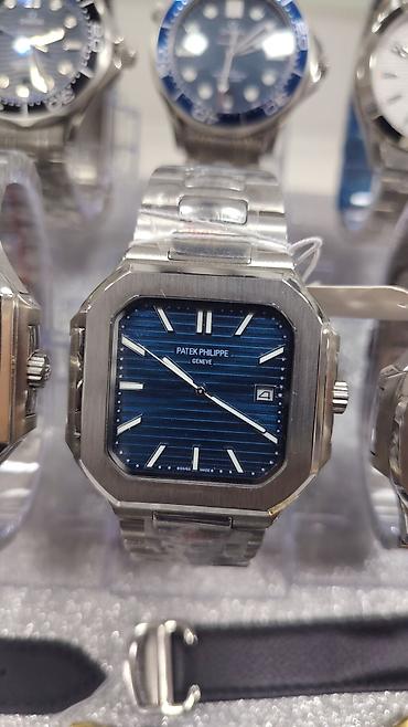 bakida saat: Patek Philippe Nautilus üslubunda kişi saatları – polad korpus və — 2