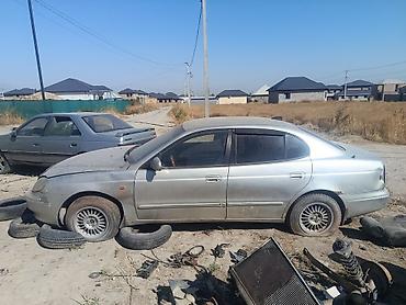 Унаа: Daewoo Leganza: 1998 г., Кол менен иштөөчү, Бензин, Седан — 2