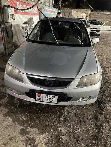 Haima: Mazda Familia: 2002 г., 1.6 л, Кол менен иштөөчү, Бензин, Хетчбек — 4