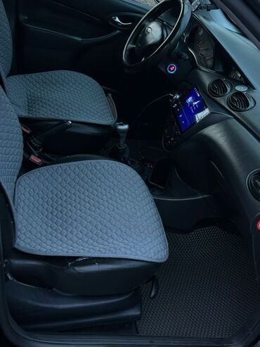 Ford: Ford Focus: 2003 г., 1.8 л, Механика, Бензиновая, Универсал — 9