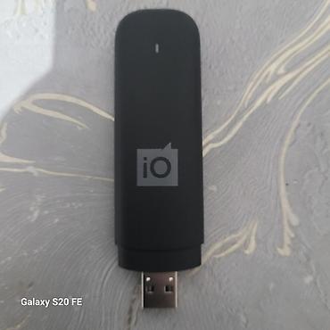 USB‑модем iO (черный) сатылат - Компактный USB‑модем для доступа в
