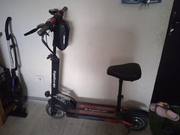 Скутеры: Электрический самокат KugooKirin M4 Pro с сиденьем. Оснащен сумкой для at lalafo.kg Скутеры: Электрический самокат KugooKirin M4 Pro с сиденьем. Оснащен сумкой для
