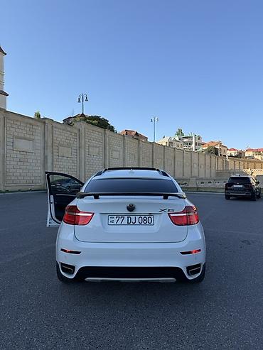BMW: BMW X6 – ağ rəngli, kupe-siluetli premium krossover. Güclü və dinamik — 7