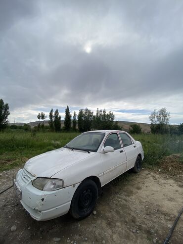диски мазда: Kia Avella: 1998 г., 1.5 л, Механика, Бензин