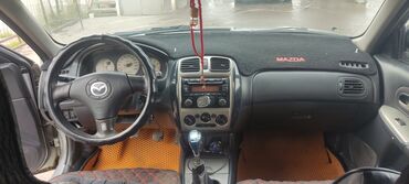 дверь мазда примаси: Mazda Familia: 2001 г., 1.6 л, Механика, Бензин, Хетчбек