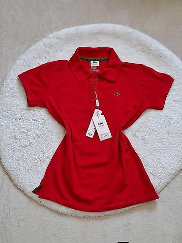 pull anbear: LACOSTE zenska majica 
Velicina S do slabijeg L 
Cena 2.800 dinara🟨🟨 — 2