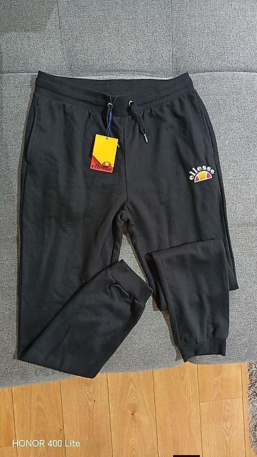 prsluk s: Ellesse muške trenerke – crne jogger pantalone - Brend: Ellesse - — 1