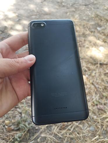 android auto: Смартфон Xiaomi (серия Redmi). Черный корпус, задняя крышка с решеткой — 1