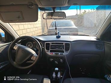 2003 ford transit: Kia Rio, mavi rəng, hetçbek kuzov. Texniki xüsusiyyətlər və təchizat — 6