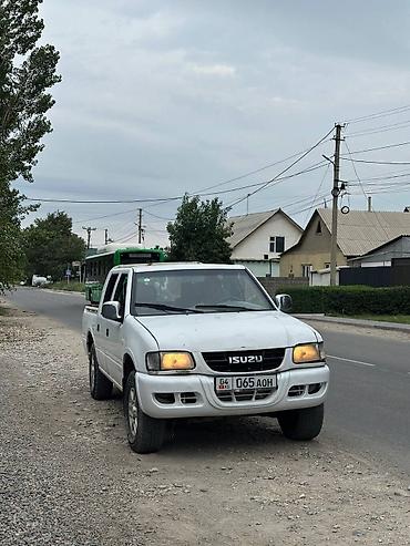 pickup: Isuzu Pickup: 2012 г., 2.4 л, Механика, Дизель, Пикап — 9