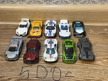 Модели автомобилей: Коллекция металлических и пластиковых игрушечных машинок (пакетами и — 8