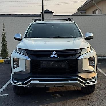 crv 2: Mitsubishi L200: 2023 г., Механика, Бензин, Пикап — 1