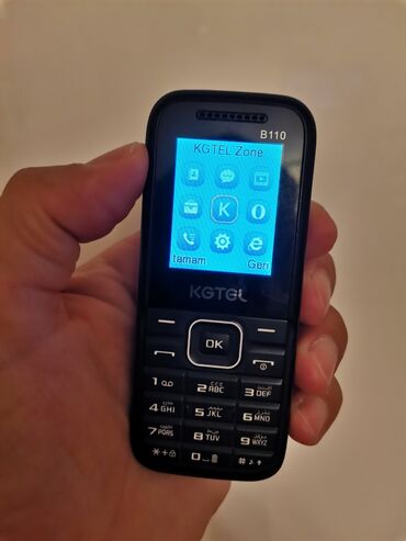 telefon üçün klaviatura: KGTEL markalı, B110 model nömrəli qara rəngli düyməli telefon. Bu