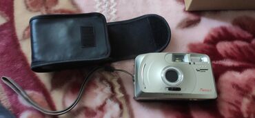 fotoaparat polaroid: Fotoaparat satilir islekdir