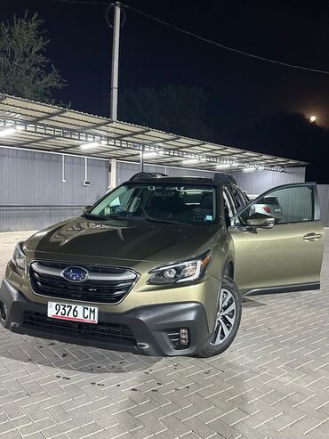купить маленькую машину недорого: Кроссовер Subaru Outback в цвете хаки с черными элементами дизайна