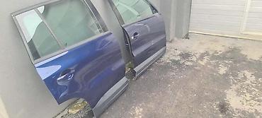 rim: VRATA ZADNJA ZA VOLKSWAGEN TIGUAN OD 2007. DO 2015. GOD. - DESNA VRATA — 2