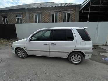 вум ау: Toyota Raum: 2002 г., Бензин, Минивэн — 4