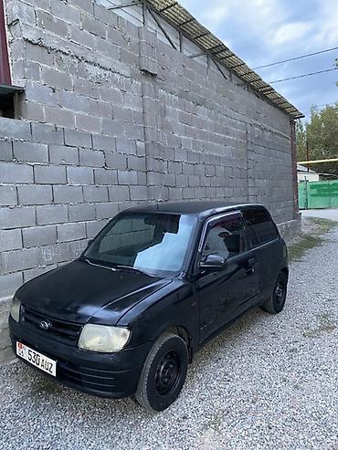 Продажа авто: Daihatsu Cuore: 2002 г., 1 л, Механика, Бензин, Купе — 10