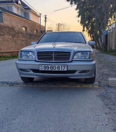 bmw 3 серия 328ci: Mercedes-Benz C-Class: 2.3 l | 1999 il Sedan