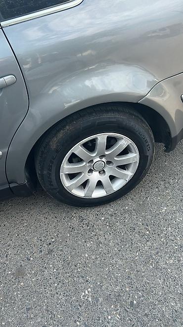 07 masin: Volkswagen orijinal 15" yüngül lehimli disklər və şinlər komplekti — 9