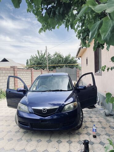 страшный машына: Mazda Demio: 2002 г., 1.5 л, Автомат, Бензин, Хэтчбэк