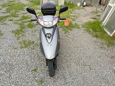 devo tiko: Скутер Honda (серия Dio) в серебристом цвете. Характеристики и — 4
