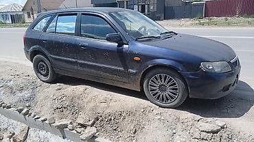 форт грзовой: Mazda 323: 2002 г., 1.6 л, Механика, Бензин, Хэтчбэк — 6