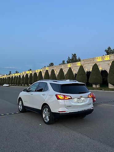 şevralet equinox: Chevrolet Equinox – ağ rəngli, şəhər və uzun yol üçün rahat krossover — 2