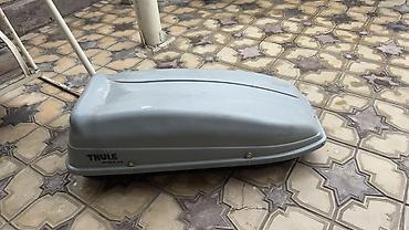 красный материал: Автобокс на крышу Thule Sidekick + поперечины - Компактный бокс на — 4