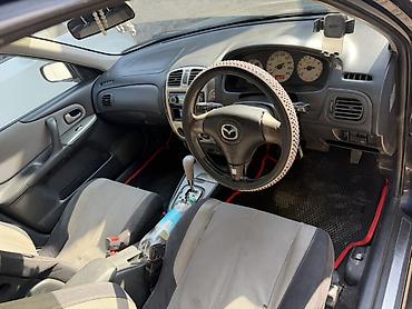 мустанг авто: Mazda 323: 2001 г., 2 л, Автомат, Газ, Универсал — 4