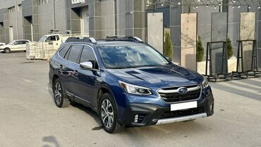 оутбек машина: Полноприводный универсал Subaru Outback синего цвета, оснащенный