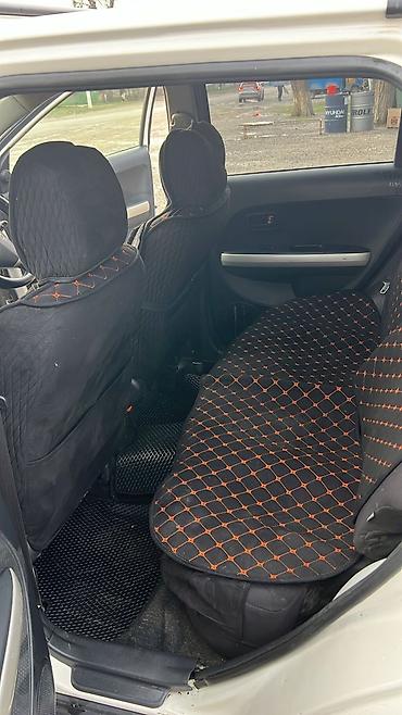 Другие автомобили: Компактный городской кроссовер (5 дверей, 5 мест), белый цвет. Кузов — 8