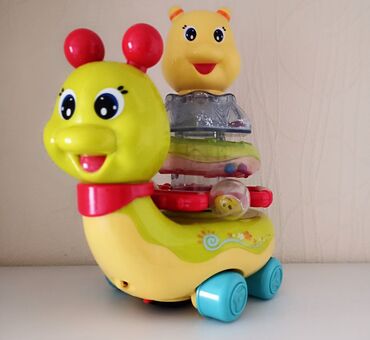 коляска для кукол бу: Музыкальная игрушка пирамидка 
двигается работает на батарейках