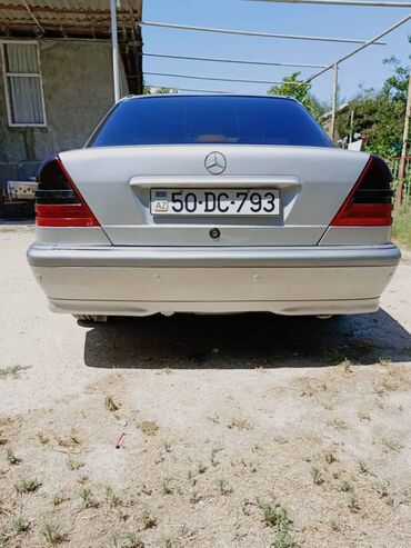 4 göz mercedes qiymeti: Mercedes-Benz 200: 0.8 l | 1999 il Sedan