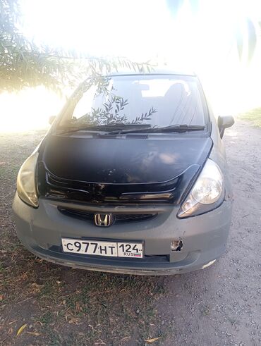 набор ключей для автомобиля б у: Хэтчбек Honda Fit, представленный в сером цвете с черными элементами