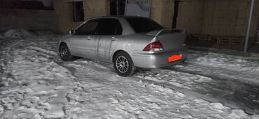 Mitsubishi: Mitsubishi Lancer: 2002 г., 1.5 л, Автомат, Бензин, Седан