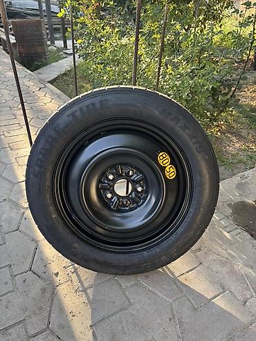 5 100 17: Докатка (запасное колесо) в сборе с металлическим штампованным диском — 1