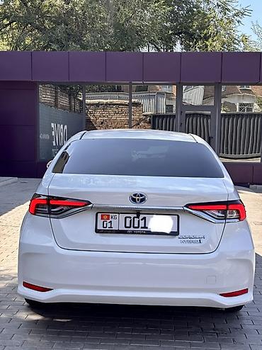 eado ev: Toyota Corolla: 2021 г., 1.8 л, Вариатор, Гибрид, Седан — 6